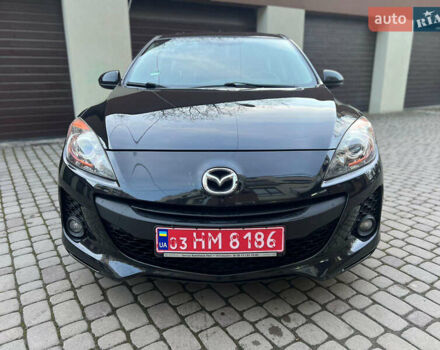 Черный Мазда 3, объемом двигателя 1.6 л и пробегом 145 тыс. км за 7799 $, фото 12 на Automoto.ua