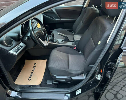 Черный Мазда 3, объемом двигателя 1.6 л и пробегом 145 тыс. км за 7799 $, фото 16 на Automoto.ua