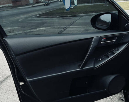 Чорний Мазда 3, об'ємом двигуна 1.6 л та пробігом 247 тис. км за 7599 $, фото 13 на Automoto.ua