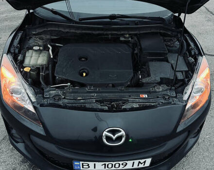 Чорний Мазда 3, об'ємом двигуна 1.6 л та пробігом 247 тис. км за 7599 $, фото 19 на Automoto.ua
