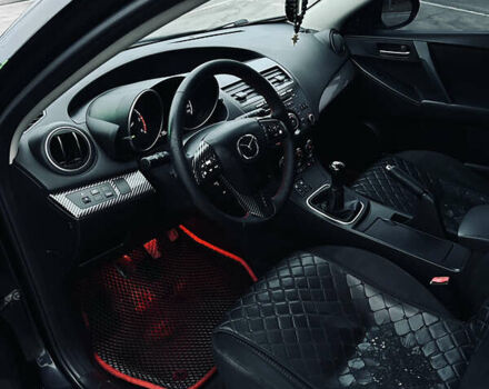 Чорний Мазда 3, об'ємом двигуна 1.6 л та пробігом 247 тис. км за 7599 $, фото 12 на Automoto.ua