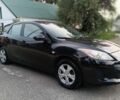 Черный Мазда 3, объемом двигателя 2 л и пробегом 280 тыс. км за 6098 $, фото 1 на Automoto.ua
