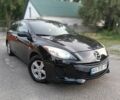 Черный Мазда 3, объемом двигателя 2 л и пробегом 280 тыс. км за 6098 $, фото 1 на Automoto.ua