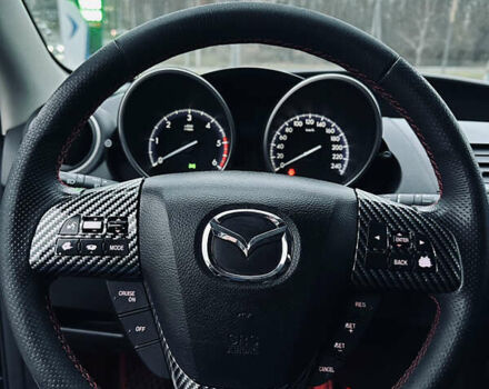 Чорний Мазда 3, об'ємом двигуна 1.6 л та пробігом 247 тис. км за 7599 $, фото 14 на Automoto.ua