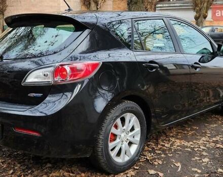 Черный Мазда 3, объемом двигателя 2 л и пробегом 240 тыс. км за 8450 $, фото 2 на Automoto.ua