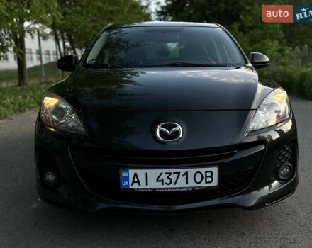 Чорний Мазда 3, об'ємом двигуна 1.6 л та пробігом 203 тис. км за 7600 $, фото 6 на Automoto.ua