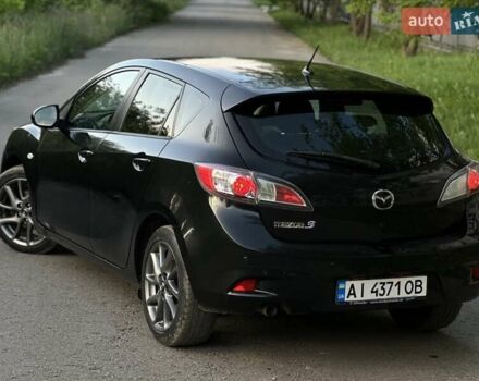 Чорний Мазда 3, об'ємом двигуна 1.6 л та пробігом 203 тис. км за 7600 $, фото 3 на Automoto.ua