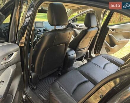 Черный Мазда 3, объемом двигателя 2 л и пробегом 231 тыс. км за 11900 $, фото 21 на Automoto.ua