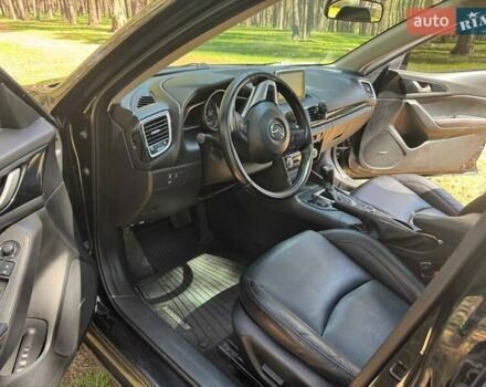 Черный Мазда 3, объемом двигателя 2 л и пробегом 231 тыс. км за 11900 $, фото 20 на Automoto.ua