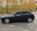 Черный Мазда 3, объемом двигателя 2 л и пробегом 230 тыс. км за 9650 $, фото 2 на Automoto.ua