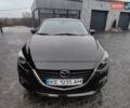 Черный Мазда 3, объемом двигателя 2.19 л и пробегом 226 тыс. км за 9000 $, фото 1 на Automoto.ua