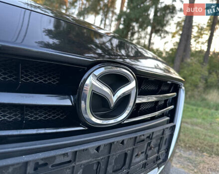 Черный Мазда 3, объемом двигателя 2 л и пробегом 143 тыс. км за 13850 $, фото 24 на Automoto.ua