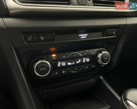 Черный Мазда 3, объемом двигателя 1.5 л и пробегом 209 тыс. км за 13057 $, фото 18 на Automoto.ua