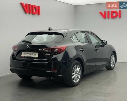 Черный Мазда 3, объемом двигателя 1.5 л и пробегом 209 тыс. км за 13057 $, фото 1 на Automoto.ua