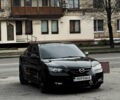 Черный Мазда 3, объемом двигателя 2 л и пробегом 188 тыс. км за 5700 $, фото 1 на Automoto.ua