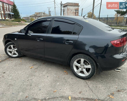 Чорний Мазда 3, об'ємом двигуна 1.6 л та пробігом 346 тис. км за 4600 $, фото 7 на Automoto.ua