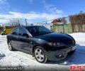 Черный Мазда 3, объемом двигателя 1.6 л и пробегом 215 тыс. км за 4600 $, фото 1 на Automoto.ua