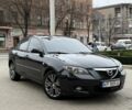 Черный Мазда 3, объемом двигателя 1.6 л и пробегом 290 тыс. км за 3650 $, фото 1 на Automoto.ua