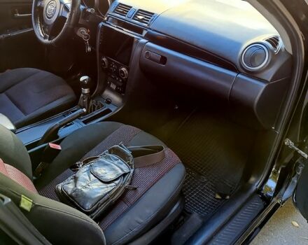 Черный Мазда 3, объемом двигателя 2 л и пробегом 281 тыс. км за 3250 $, фото 5 на Automoto.ua