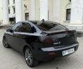 Черный Мазда 3, объемом двигателя 1.6 л и пробегом 290 тыс. км за 3650 $, фото 3 на Automoto.ua
