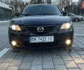 Черный Мазда 3, объемом двигателя 2 л и пробегом 292 тыс. км за 3700 $, фото 1 на Automoto.ua