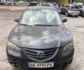 Черный Мазда 3, объемом двигателя 2 л и пробегом 228 тыс. км за 2400 $, фото 1 на Automoto.ua