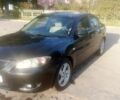 Черный Мазда 3, объемом двигателя 1.6 л и пробегом 320 тыс. км за 3400 $, фото 1 на Automoto.ua