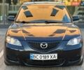 Черный Мазда 3, объемом двигателя 2.3 л и пробегом 243 тыс. км за 3737 $, фото 1 на Automoto.ua
