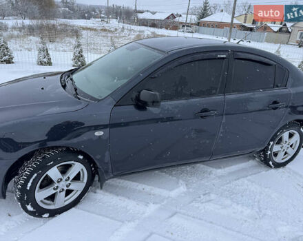 Черный Мазда 3, объемом двигателя 1.6 л и пробегом 348 тыс. км за 4500 $, фото 1 на Automoto.ua