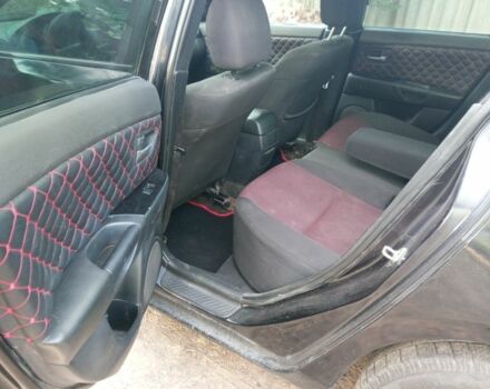 Чорний Мазда 3, об'ємом двигуна 1.6 л та пробігом 325 тис. км за 3750 $, фото 13 на Automoto.ua