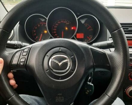 Чорний Мазда 3, об'ємом двигуна 2 л та пробігом 240 тис. км за 5999 $, фото 6 на Automoto.ua