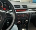 Чорний Мазда 3, об'ємом двигуна 2 л та пробігом 240 тис. км за 5999 $, фото 2 на Automoto.ua