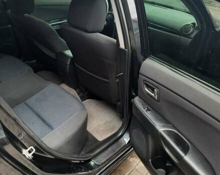 Чорний Мазда 3, об'ємом двигуна 2 л та пробігом 240 тис. км за 5999 $, фото 11 на Automoto.ua