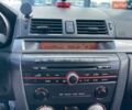Чорний Мазда 3, об'ємом двигуна 2 л та пробігом 295 тис. км за 4490 $, фото 23 на Automoto.ua