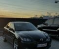 Черный Мазда 3, объемом двигателя 1.6 л и пробегом 230 тыс. км за 3100 $, фото 1 на Automoto.ua