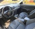 Черный Мазда 3, объемом двигателя 1.6 л и пробегом 261 тыс. км за 3600 $, фото 17 на Automoto.ua