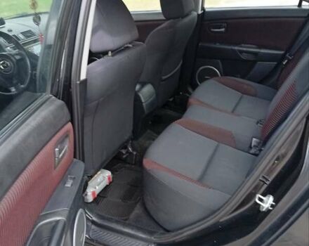 Черный Мазда 3, объемом двигателя 2 л и пробегом 242 тыс. км за 5000 $, фото 2 на Automoto.ua