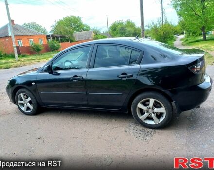 Черный Мазда 3, объемом двигателя 2 л и пробегом 250 тыс. км за 5200 $, фото 2 на Automoto.ua