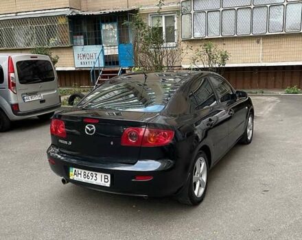 Черный Мазда 3, объемом двигателя 2 л и пробегом 174 тыс. км за 5300 $, фото 7 на Automoto.ua