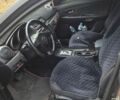 Черный Мазда 3, объемом двигателя 1.6 л и пробегом 273 тыс. км за 3300 $, фото 1 на Automoto.ua
