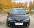 Черный Мазда 3, объемом двигателя 2 л и пробегом 242 тыс. км за 5000 $, фото 19 на Automoto.ua