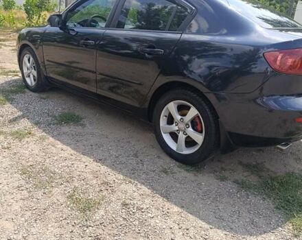 Чорний Мазда 3, об'ємом двигуна 1.6 л та пробігом 230 тис. км за 4500 $, фото 8 на Automoto.ua