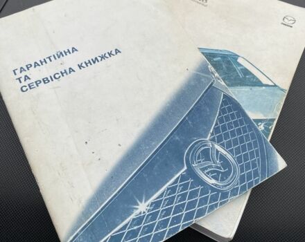 Черный Мазда 3, объемом двигателя 2 л и пробегом 184 тыс. км за 3699 $, фото 6 на Automoto.ua