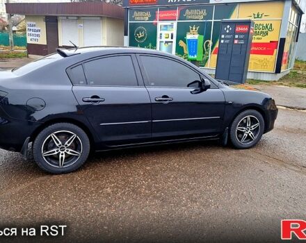 Черный Мазда 3, объемом двигателя 2 л и пробегом 173 тыс. км за 4600 $, фото 3 на Automoto.ua