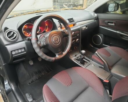 Чорний Мазда 3, об'ємом двигуна 2 л та пробігом 153 тис. км за 5500 $, фото 6 на Automoto.ua