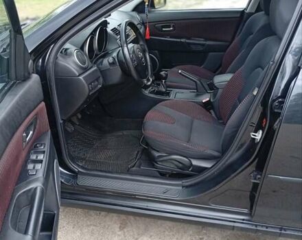 Черный Мазда 3, объемом двигателя 2 л и пробегом 242 тыс. км за 5000 $, фото 6 на Automoto.ua