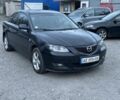 Черный Мазда 3, объемом двигателя 1.6 л и пробегом 250 тыс. км за 3999 $, фото 1 на Automoto.ua