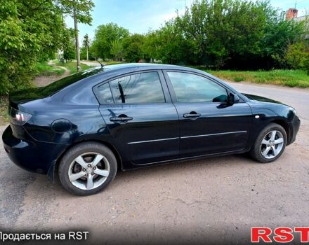 Черный Мазда 3, объемом двигателя 2 л и пробегом 250 тыс. км за 5200 $, фото 3 на Automoto.ua