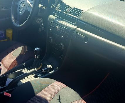 Чорний Мазда 3, об'ємом двигуна 1.6 л та пробігом 285 тис. км за 3900 $, фото 4 на Automoto.ua
