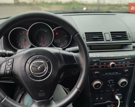 Чорний Мазда 3, об'ємом двигуна 2 л та пробігом 175 тис. км за 5300 $, фото 15 на Automoto.ua